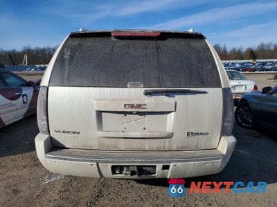 Zdjęcie 6 z 13 samochodu: 2012 GMC YUKON DENALI HYBRID VIN:1GKS2GEJ3CR222808 - miniatura