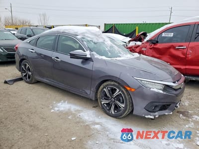 Czwarte zdjęcie samochodu z boku: 2016 HONDA CIVIC TOURING VIN:19XFC1F93GE041561 - miniatura