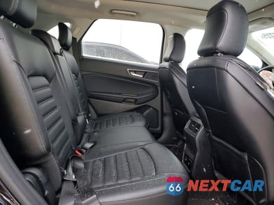 Zdjęcie 11 z 13 samochodu: 2021 FORD EDGE SEL VIN:2FMPK4J94MBA33418 - miniatura