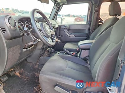 Zdjęcie 7 z 12 samochodu: 2017 JEEP WRANGLER SPORT VIN:1C4AJWAG9HL610652 - miniatura