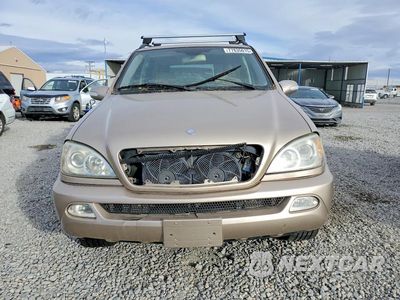 Piąte zdjęcie samochodu w środku: 2003 MERCEDES BENZ ML VIN:4JGAB57E64A469036 - miniatura
