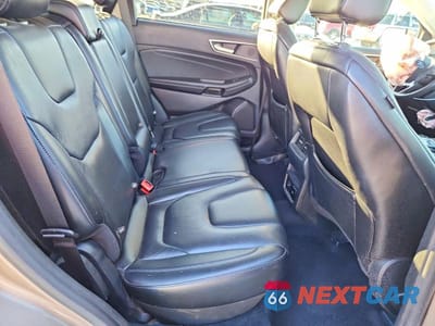 Zdjęcie 10 z 12 samochodu: 2021 FORD EDGE TITANIUM VIN:2FMPK4K96MBA27182 - miniatura