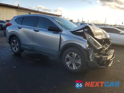 Czwarte zdjęcie samochodu z boku: 2018 HONDA CR-V VIN:2HKRW5H3XJH425618 - miniatura