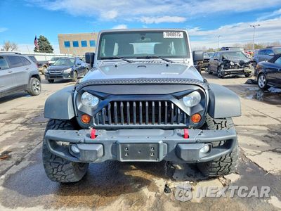 Piąte zdjęcie samochodu w środku: 2013 JEEP WRANGLER UNLIMITED SPORT VIN:1C4BJWDG0DL669440 - miniatura