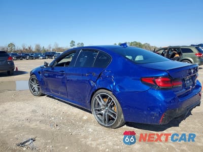Czwarte zdjęcie samochodu z boku: 2022 BMW M5 VIN:WBS83CH05NCH70776 - miniatura