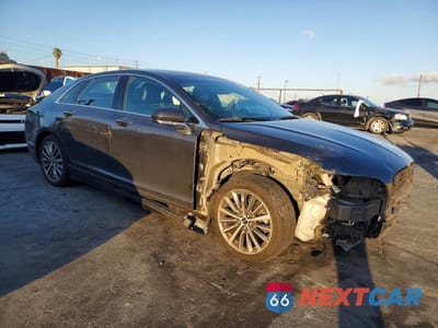 Czwarte zdjęcie samochodu z boku: 2017 LINCOLN MKZ PREMIERE VIN:3LN6L5B91HR630210 - miniatura