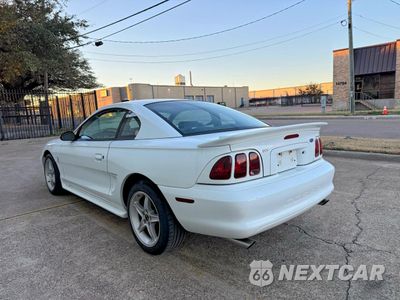 Trzecie zdjęcie samochodu z tyłu: 1997 FORD MUSTANG COBRA VIN:1FALP47V5VF111087 - miniatura