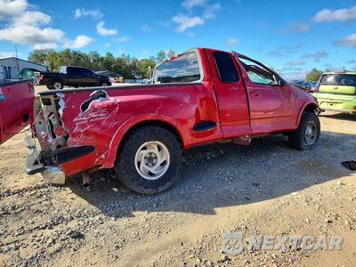 Trzecie zdjęcie samochodu z tyłu: 2000 FORD F150 VIN:1FTRX08LXYKA05403 - miniatura