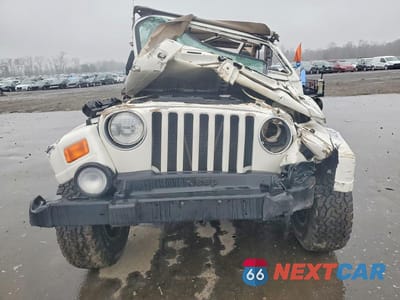 Piąte zdjęcie samochodu w środku: 2000 JEEP WRANGLER / TJ SAHARA VIN:1J4FA59S6YP749360 - miniatura