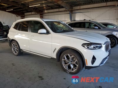 Czwarte zdjęcie samochodu z boku: 2022 BMW X3 XDRIVE30I VIN:5UX53DP0XN9M66319 - miniatura