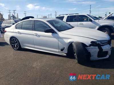 Czwarte zdjęcie samochodu z boku: 2021 BMW 530E VIN:WBA13AG06MCF92046 - miniatura