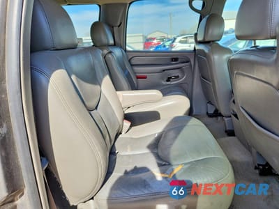 Zdjęcie 11 z 14 samochodu: 2006 GMC YUKON XL DENALI VIN:1GKFK66U36J166098 - miniatura