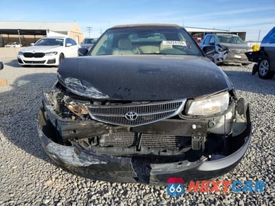 Piąte zdjęcie samochodu w środku: 2000 TOYOTA CAMRY SOLARA SE VIN:2T1FF28P1YC381090 - miniatura