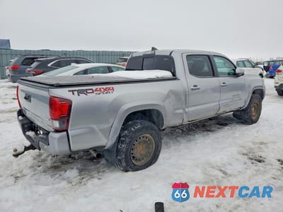 Trzecie zdjęcie samochodu z tyłu: 2018 TOYOTA TACOMA DOUBLE CAB VIN:5TFDZ5BN0JX030315 - miniatura