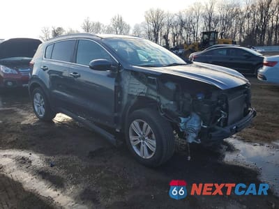 Czwarte zdjęcie samochodu z boku: 2017 KIA SPORTAGE LX VIN:KNDPMCAC0H7121577 - miniatura