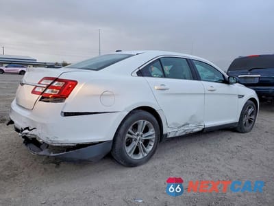 Trzecie zdjęcie samochodu z tyłu: 2016 FORD TAURUS SE VIN:1FAHP2D89GG125113 - miniatura