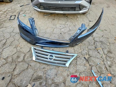 Zdjęcie 12 z 13 samochodu: 2014 NISSAN SENTRA S VIN:3N1AB7AP1EL687182 - miniatura