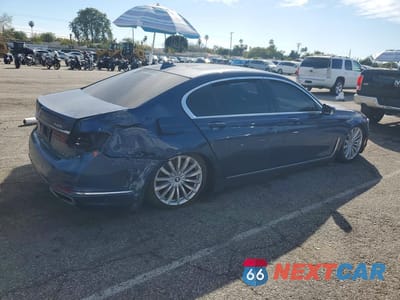 Trzecie zdjęcie samochodu z tyłu: 2022 BMW 740 I VIN:WBA7T2C06NCH58234 - miniatura