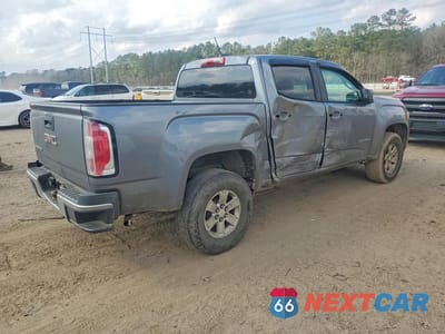 Trzecie zdjęcie samochodu z tyłu: 2018 GMC CANYON VIN:1GTG5BEA5J1109031 - miniatura