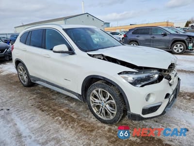 Czwarte zdjęcie samochodu z boku: 2018 BMW X1 XDRIVE28I VIN:WBXHT3C33J5K25778 - miniatura