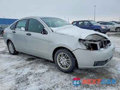 Czwarte zdjęcie samochodu z boku: 2010 FORD FOCUS SE VIN:1FAHP3FN4AW112002 - miniatura