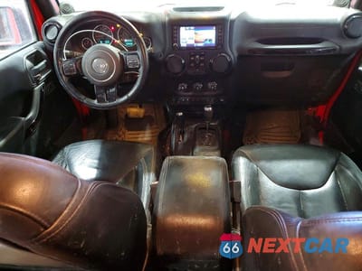Zdjęcie 8 z 13 samochodu: 2014 JEEP WRANGLER UNLIMITED SAHARA VIN:1C4HJWEG1EL324346 - miniatura
