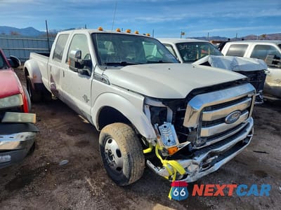 Czwarte zdjęcie samochodu z boku: 2016 FORD F350 SUPER DUTY VIN:1FT8W3DT7GEA34747 - miniatura