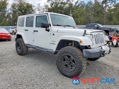 Czwarte zdjęcie samochodu z boku: 2017 JEEP WRANGLER UNLIMITED SAHARA VIN:1C4BJWEG3HL525935 - miniatura