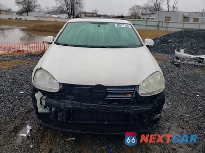 Piąte zdjęcie samochodu w środku: 2010 VOLKSWAGEN JETTA WOLFSBURG VIN:3VWRA7AJ1AM100057 - miniatura