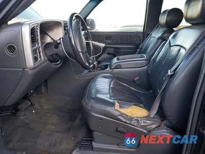 Zdjęcie 7 z 12 samochodu: 2003 GMC NEW SIERRA K1500 VIN:1GTEK19TX3E113979 - miniatura