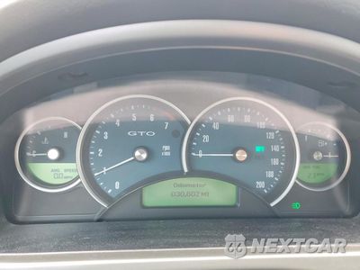 Zdjęcie 9 z 13 samochodu: 2004 PONTIAC GTO VIN:6G2VX12G64L287373 - miniatura