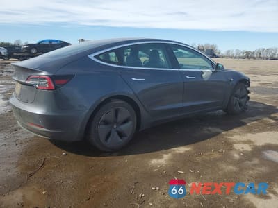 Trzecie zdjęcie samochodu z tyłu: 2019 TESLA MODEL 3 VIN:5YJ3E1EA0KF407410 - miniatura