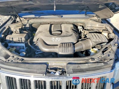 Zdjęcie 12 z 13 samochodu: 2012 JEEP GRAND CHEROKEE LAREDO VIN:1C4RJFAG2CC245730 - miniatura