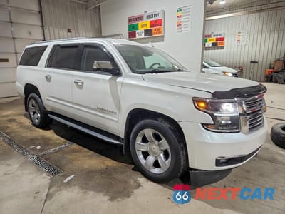 Czwarte zdjęcie samochodu z boku: 2017 CHEVROLET SUBURBAN K1500 PREMIER VIN:1GNSKJKC0HR327898 - miniatura
