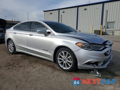 Czwarte zdjęcie samochodu z boku: 2017 FORD FUSION SE HYBRID VIN:3FA6P0LU8HR163677 - miniatura