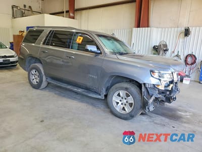 Czwarte zdjęcie samochodu z boku: 2019 CHEVROLET TAHOE C1500 LS VIN:1GNSCAKC0KR305226 - miniatura