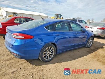 Trzecie zdjęcie samochodu z tyłu: 2017 FORD FUSION SE VIN:3FA6P0H74HR215065 - miniatura