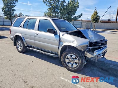 Czwarte zdjęcie samochodu z boku: 1999 NISSAN PATHFINDER XE VIN:JN8AR05S2XW297448 - miniatura