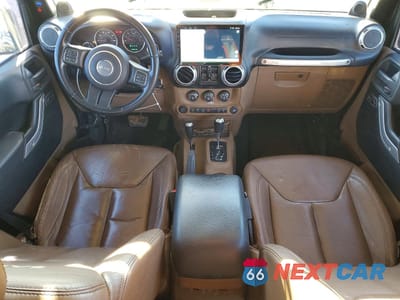 Zdjęcie 8 z 12 samochodu: 2013 JEEP WRANGLER UNLIMITED SAHARA VIN:1C4HJWEG7DL534853 - miniatura