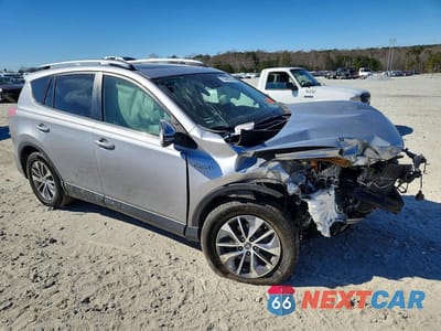 Czwarte zdjęcie samochodu z boku: 2018 TOYOTA RAV4 HV LE VIN:JTMRJREV3JD175348 - miniatura