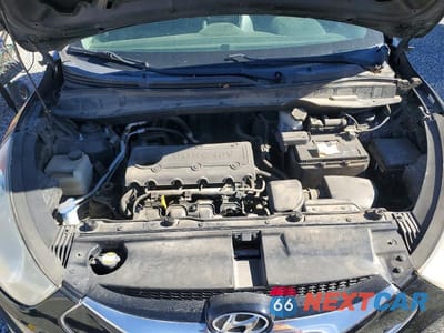 Zdjęcie 12 z 13 samochodu: 2010 HYUNDAI TUCSON LIMITED VIN:KM8JUCAC5AU085362 - miniatura