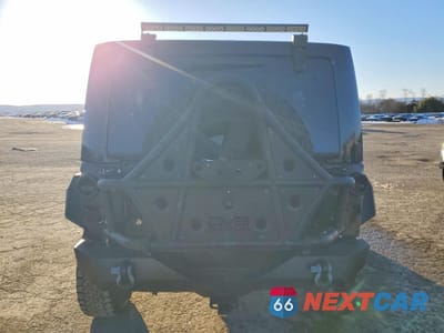 Zdjęcie 6 z 12 samochodu: 2013 JEEP WRANGLER UNLIMITED SAHARA VIN:1C4HJWEG7DL534853 - miniatura