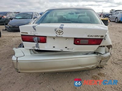 Zdjęcie 6 z 12 samochodu: 1999 TOYOTA CAMRY LE VIN:JT2BG28K7X0350945 - miniatura