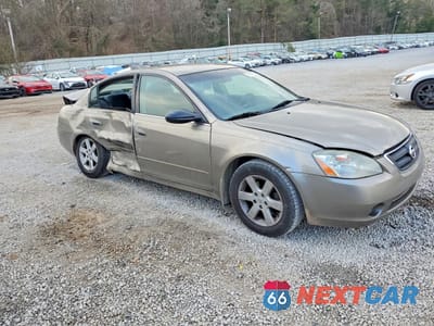 Czwarte zdjęcie samochodu z boku: 2002 NISSAN ALTIMA 2.5 VIN:1N4AL11D82C262343 - miniatura