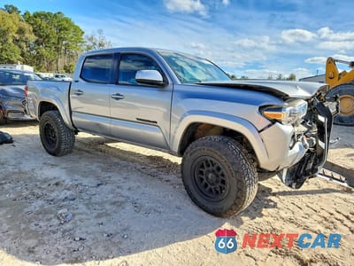 Czwarte zdjęcie samochodu z boku: 2020 TOYOTA TACOMA DOUBLE CAB VIN:3TMCZ5AN9LM297149 - miniatura