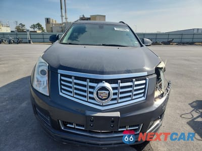 Piąte zdjęcie samochodu w środku: 2015 CADILLAC SRX VIN:3GYFNAE33FS619840 - miniatura