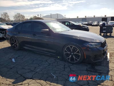 Czwarte zdjęcie samochodu z boku: 2021 BMW 540 I VIN:WBA53BJ01MWW94706 - miniatura