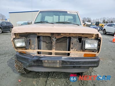 Piąte zdjęcie samochodu w środku: 1987 FORD RANGER VIN:1FTCR11AXHUA91458 - miniatura