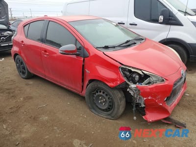 Czwarte zdjęcie samochodu z boku: 2015 TOYOTA PRIUS C VIN:JTDKDTB39F1103863 - miniatura