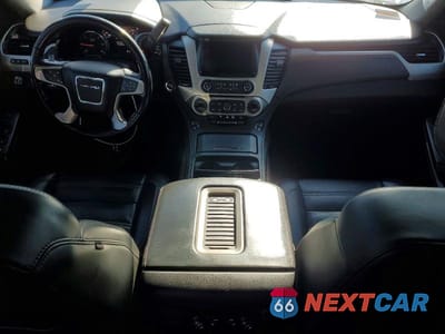 Zdjęcie 8 z 13 samochodu: 2018 GMC YUKON DENALI VIN:1GKS1CKJ2JR267428 - miniatura